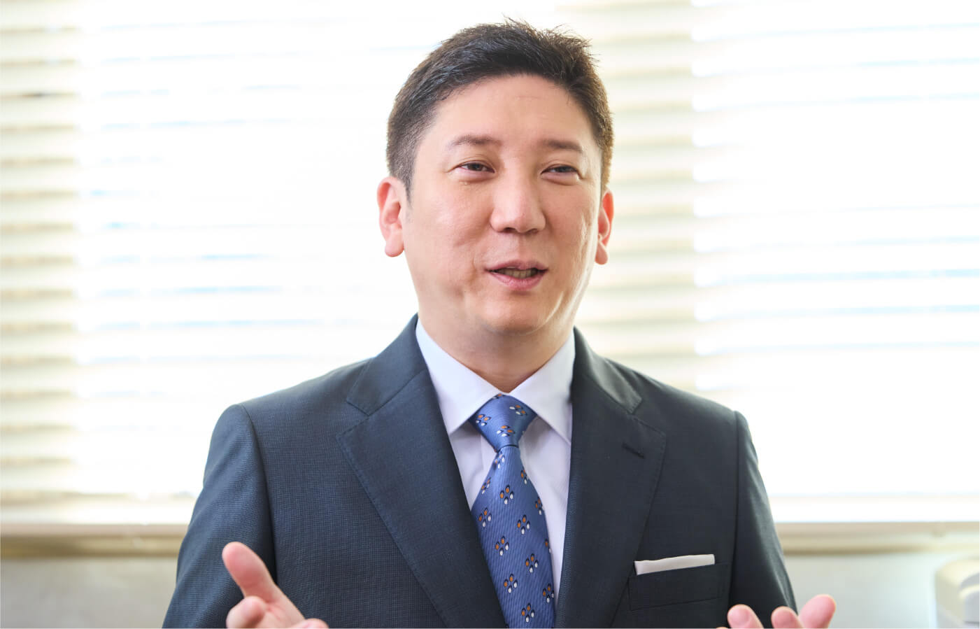 写真：取締役CFO 野﨑 智広